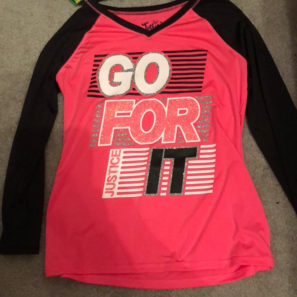 A pink long sleeve shirt from justice.